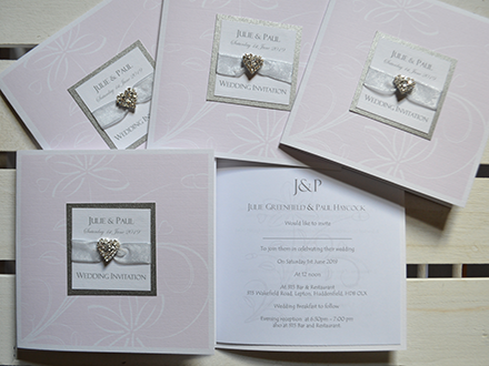 Louisa single fold wedding invitations with front panel, organza bow and diamante heart